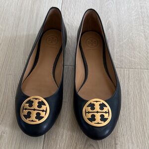 Tory Burch Black Flats with Gold Emblem